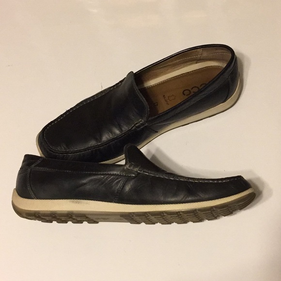 Ecco Navy/ black leather loafer with white sole.